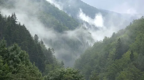 Gorgeous mountain landscape with clouds rising up 4k Stock Footage 46217550