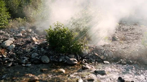 Gorgeous mountain river water stream with natural mist surrounded by stones Stock Footage 145488733
