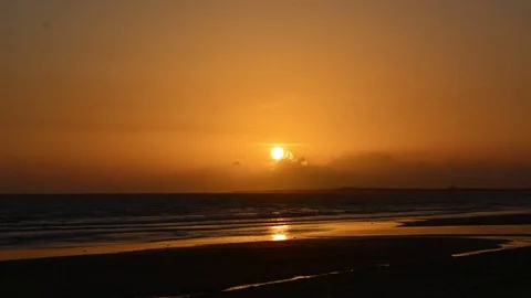 Gorgeous Orange sunset at beach in 4K Stock Footage 70164035
