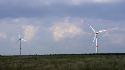 Gorgeous panoramic view on wind power turbine generator station ecology saving Stock Footage 95321084