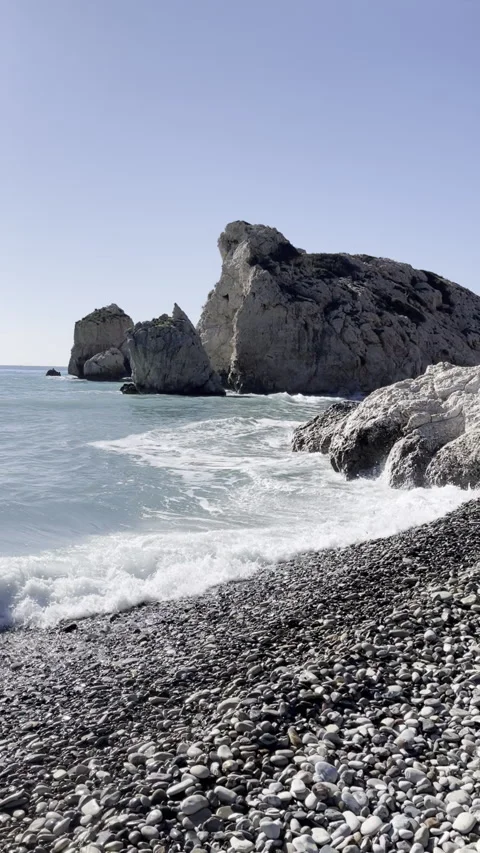 A Gorgeous Rocky Beach That Is Surrounded by Waves and Crystal Clear Blue Water Stock Footage 280564397