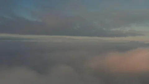 Gorgeous slow moving pink clouds through aerial background over Singapore Stock Footage 118591223