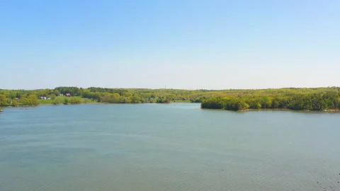 Gorgeous tracking drone shot of pristine estuary in Maine in summer. Stock Footage 144387253