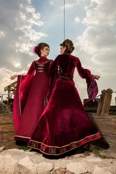 Gorgeous two ladies in vintage clothes on a boat Stock Photos