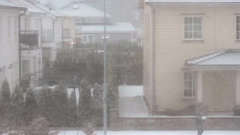 Gorgeous view of heavy snowfall in early spring. Video stock 150176159