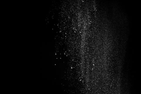 Gorgeous white powder pattern isolated on black background Stockfoto's