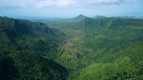 Gorges view point in Mauritius. Reverse flight above tropical forest. 動画素材 102400757
