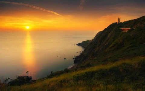 Gorliz lighthouse at sunset Stock Photos
