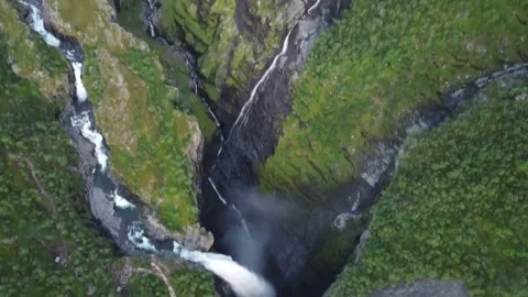 Gorzi Waterfall and Gorsabrua Bridge Revealed From Above by a Tilt Up, Norway 스톡 동영상 344996516