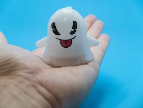 Gost on hand - blu backgroud Stock Photos