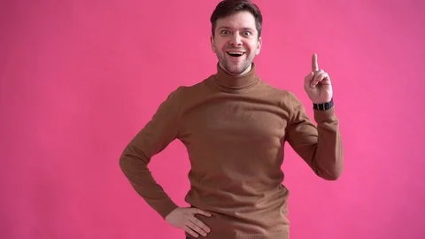 Got an Idea, having good idea, concept of positive emotions isolated on pink Stock Footage 123916303