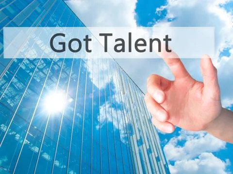Got Talent - Hand pressing a button on blurred background concept on visual s Stock Photos