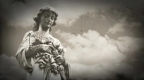 Goth gravestone statue angel with timelapse clouds Stock Footage