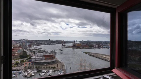 Gothenburg skyline seen from an open window. Zoom out. Timelapse. 4K, 25p Vídeos de archivo 100258906