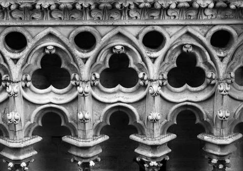 Gothic architectural elements showcase detailed stone carvings at Notre-Dame  库存照片