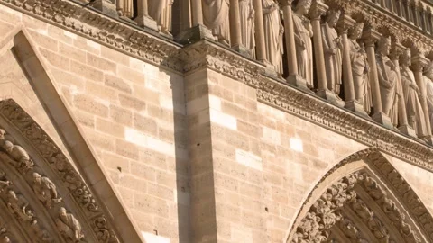Gothic Architecture and Sculptures on Notre Dame Cathedral Facade in Paris 스톡 동영상 344615760