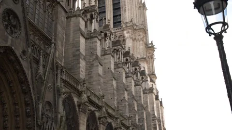 Gothic Architecture and Stone Facade of Notre Dame Cathedral in Paris Stock-Footage 344106419