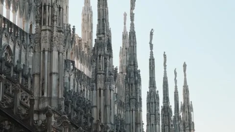 Gothic architecture of Milan Cathedral with spires, statues, pinnacles and Video stock 322071040