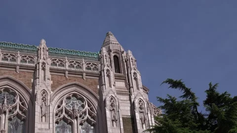 Gothic architecture with stained glass windows under clear sky 库存影片 312770025