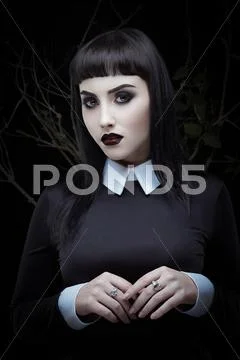 Gothic brunette girl Stock Photos