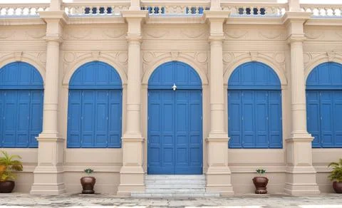Gothic building and blue door. Stock Photos