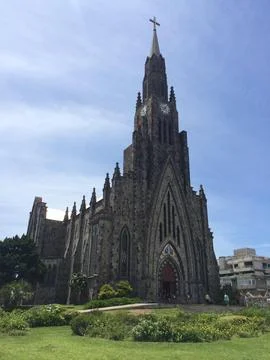 Gothic cathedral under blue sky Stock Photos