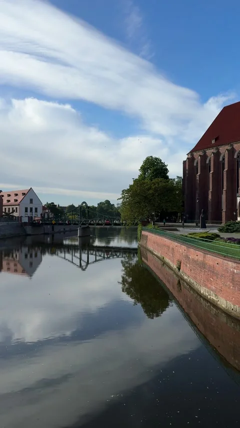 Gothic church and riverside view in Wroclaw, Poland Stock Footage 310796964