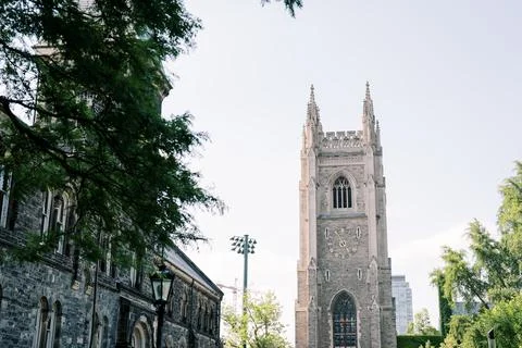 Gothic clock tower at University of Toronto campus Stock Photos