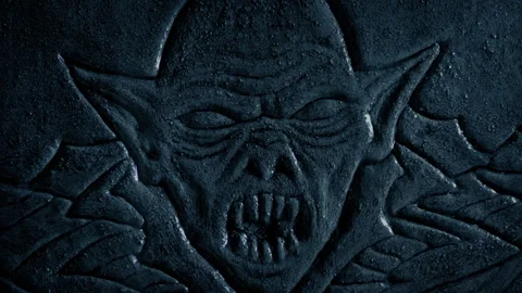Gothic Demon Face Carved In Stone On Rainy Night Stock Footage 142748618