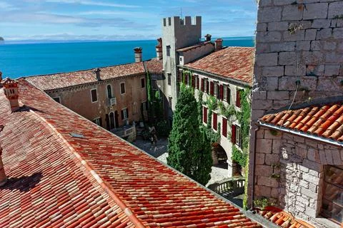 Gothic Duino castle on a cliff over the Gulf of Trieste (Adriatic sea), Italy Stock Photos