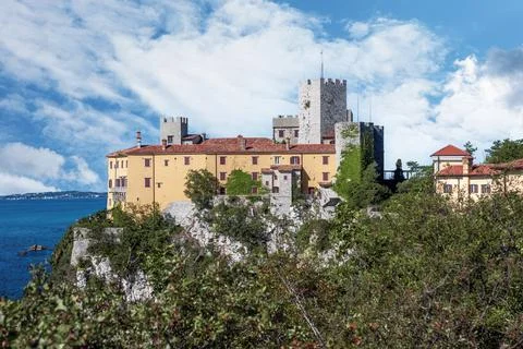 Gothic Duino castle on a cliff over the Gulf of Trieste (Adriatic sea), Italy Stock Photos