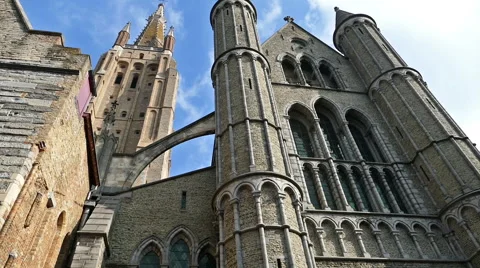 Gothic facade and tall belfry of the Church of Our Lady, Bruges, Belgium Stock Footage 60232623