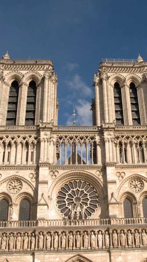 Gothic Facade of Notre Dame Cathedral in Paris France 스톡 동영상 344527961
