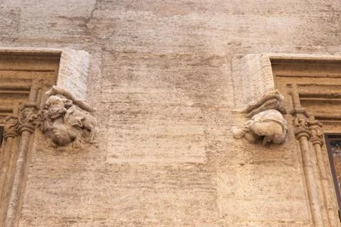 Gothic gargoyle bas relief on an ancient historical building in Valencia Stock Photos