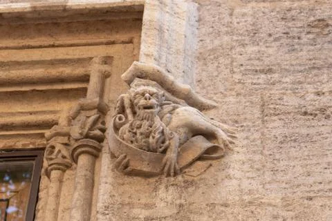 Gothic gargoyle bas relief on an ancient historical building in Valencia Stock Photos