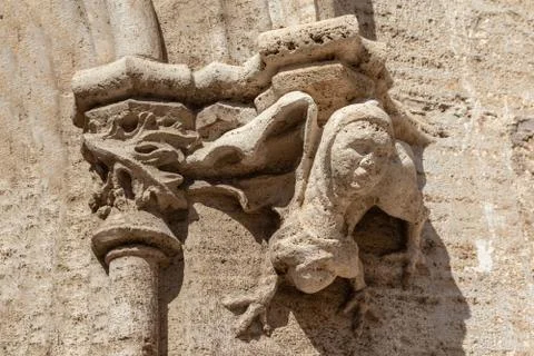 Gothic gargoyle bas relief on an ancient historical building in Valencia Stock Photos