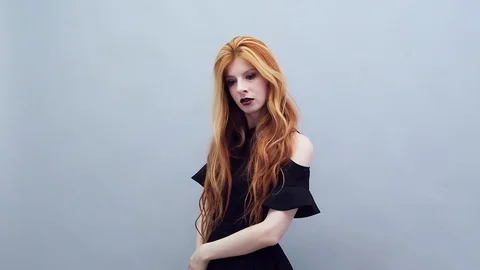Gothic girl on grey background Stock Footage 116992632