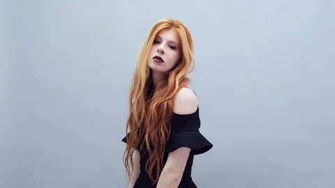 Gothic girl on grey background Stock Footage 116992745