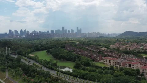 Gothic housing complex in the city golf course Stock Footage 234575031