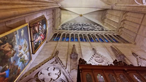 Gothic interior of historic Notre Dame de Paris Cathedral, France. Low-angle pov Stock Footage 313477660