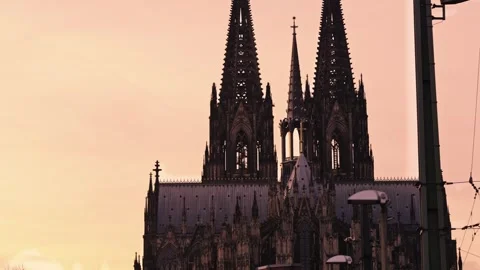 Gothic Majesty: The Cologne Cathedral Framed by the Hohenzollern Bridge Stock Footage 324440814