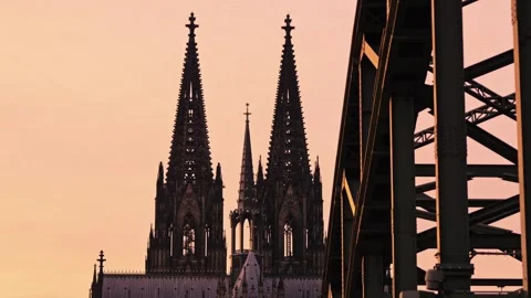 Gothic Majesty: The Cologne Cathedral Framed by the Hohenzollern Bridge Stock Footage 324441326