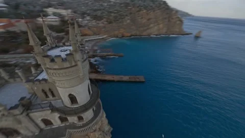 Gothic medieval castle on top of a cliff, swallow's nest, FPV drone Stock Footage 295021967