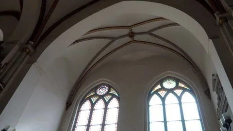 Gothic ribbed vaults and stained-glass windows in Riga Cathedral Stock Footage 304686481