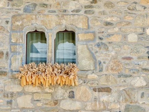Gothic rustic window on exterior wall made of stone in Spain. Spanish medie.. Stock Photos