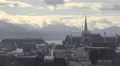 Gothic spire of Saint Francois Church, misty cityscape of Lausanne, Switzerland HD Footage