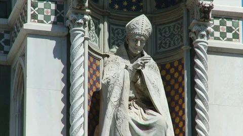 Gothic statue architecural details of the exterior facade of the Florence Duomo Stock Footage 74807778