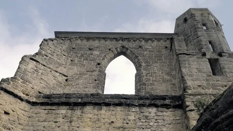 Gothic stone window with arched arch. Gothic cathedral without roof. Видео 88191874