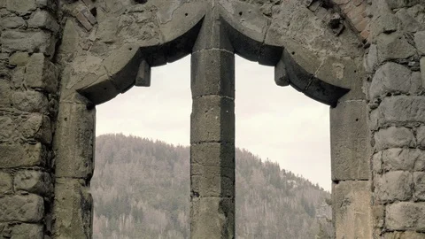 Gothic stone window with arched arch. Gothic cathedral without roof. Видео 88191876