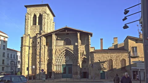 The Gothic-style facade with the bell tower of the Grande Église de Saint-Étienn Stock Footage 268619640
